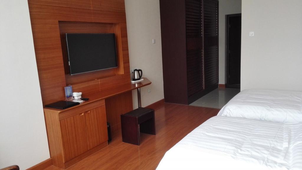 Weihai Times Business Hotel Номер фото